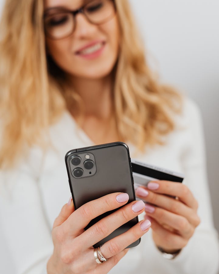 Person comparing personal loan offers on a smartphone